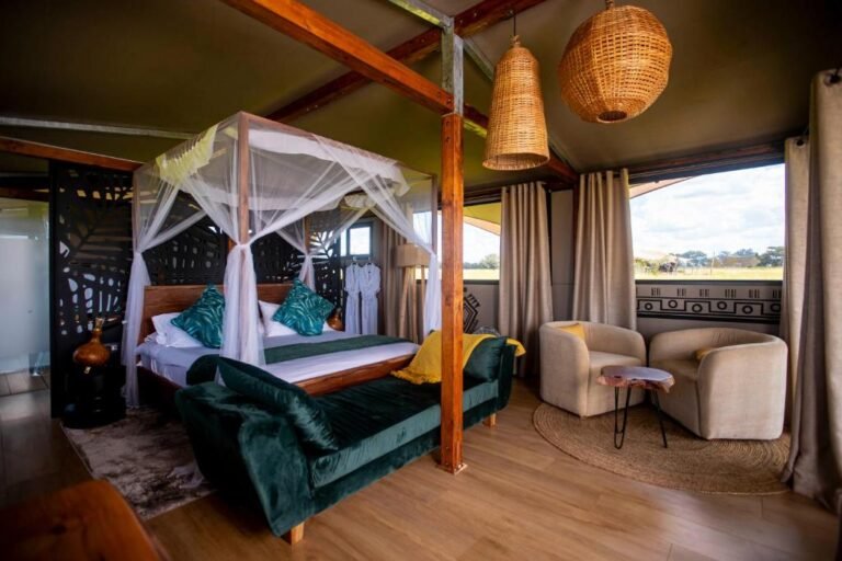 Elegant safari tent interior at Escarpment Serengeti Luxury Camp