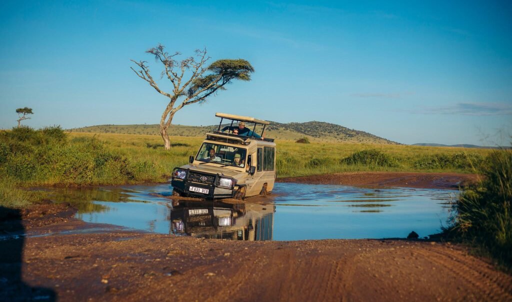 Private 4x4 safari vehicle exploring Serengeti National Park during Tanzania Safari in May