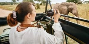 Romantic bespoke honeymoon safari in Tanzania featuring safari jeep in Ngorongoro Crater