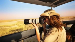 Tanzania wildlife photography safari with safari vehicle and professional camera setup