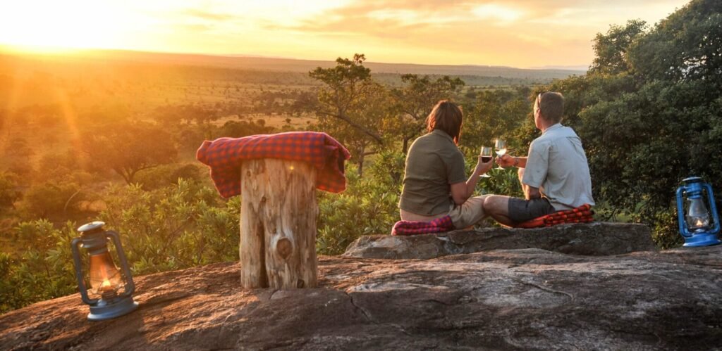 Travelers enjoying a Tanzania safari in October while observing wildlife in Serengeti National Park